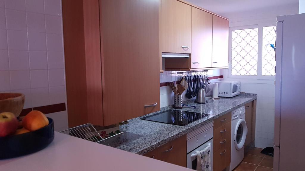 Kuchyňa alebo kuchynka v ubytovaní Costa del Sol Manilva Playa Spa