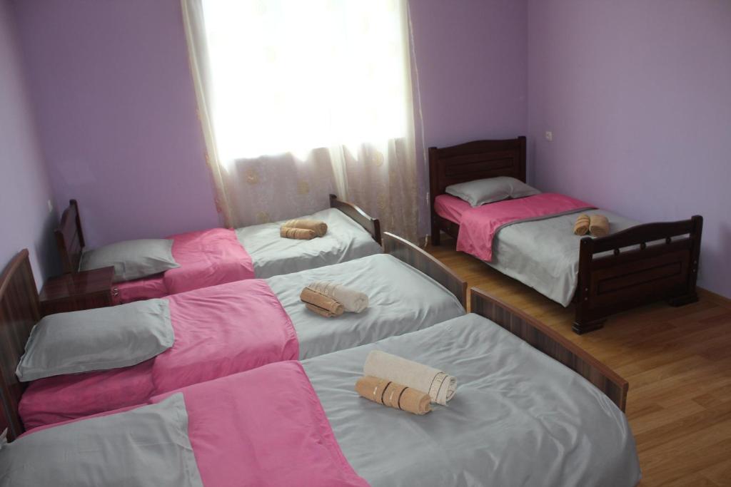 Postel nebo postele na pokoji v ubytování Mariana's Guest House