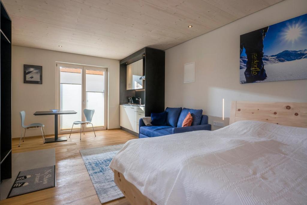 Ένα ή περισσότερα κρεβάτια σε δωμάτιο στο powderhome