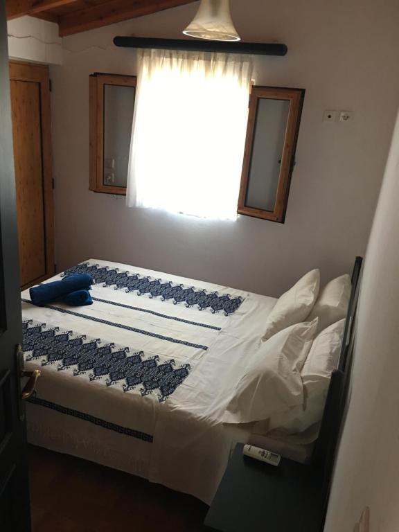 Postel nebo postele na pokoji v ubytování Casa Kalliroi