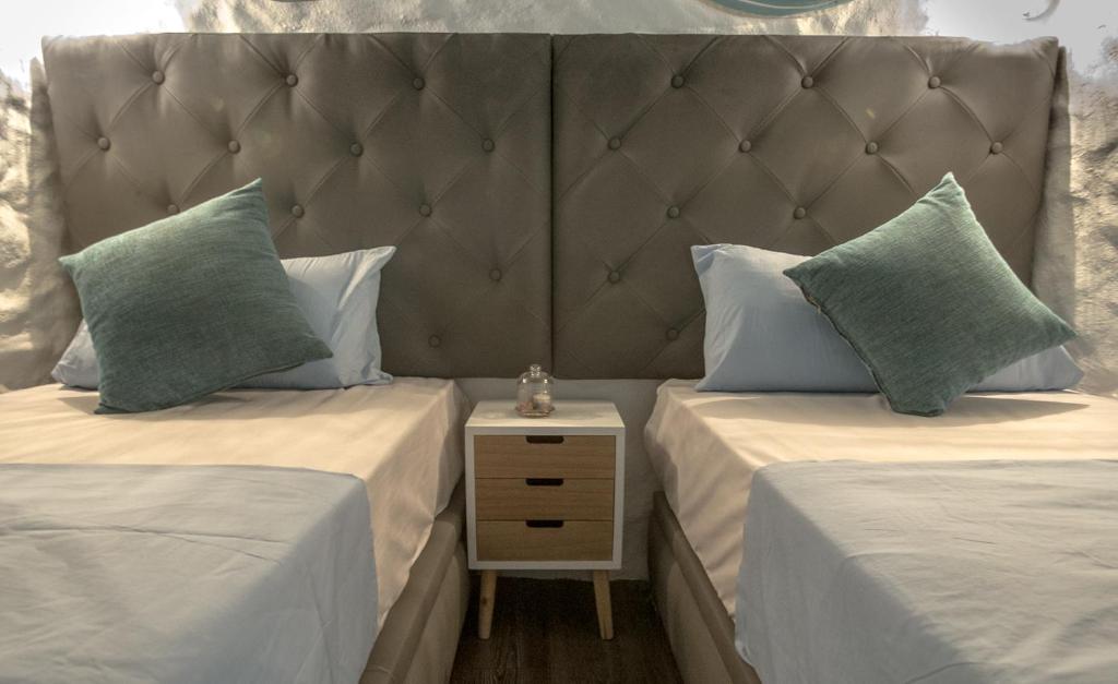 Una cama o camas en una habitación de Riad Antek