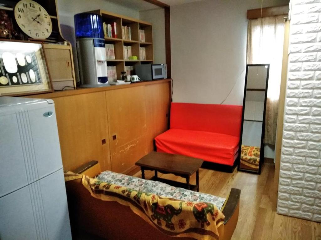 Kuchyň nebo kuchyňský kout v ubytování Travellersdou Kirinya