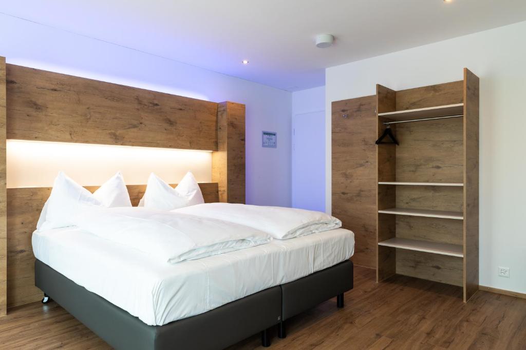 Postel nebo postele na pokoji v ubytování TRIP INN JET HOTEL Zürich Airport