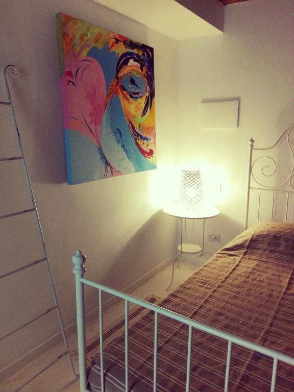 Posteľ alebo postele v izbe v ubytovaní Tambien B&B