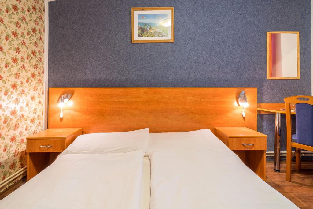 Postel nebo postele na pokoji v ubytování Easy Star Hotel