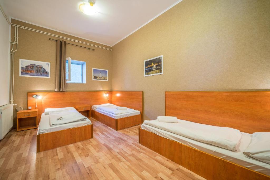 Postel nebo postele na pokoji v ubytování Easy Star Hotel