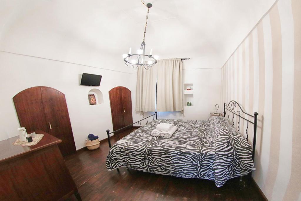 Posteľ alebo postele v izbe v ubytovaní Al Vecchio Cellaio Historical Guest House