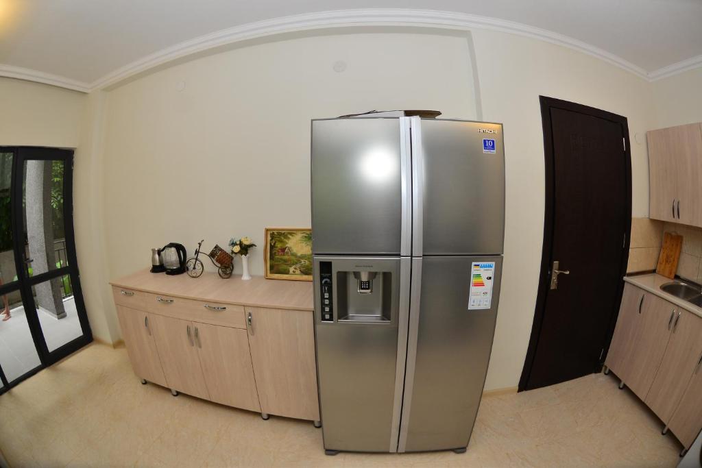 Kuchyň nebo kuchyňský kout v ubytování Hotel Gori
