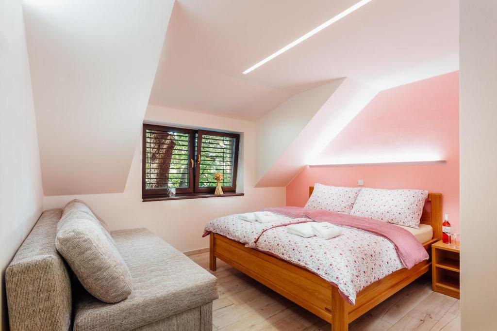 Postel nebo postele na pokoji v ubytování Penzion U Harmáčků