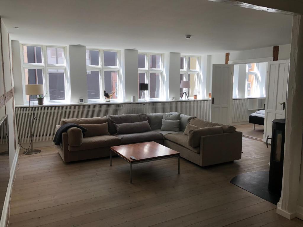 a living room with a couch and a coffee table at K10 Apartments in Copenhagen