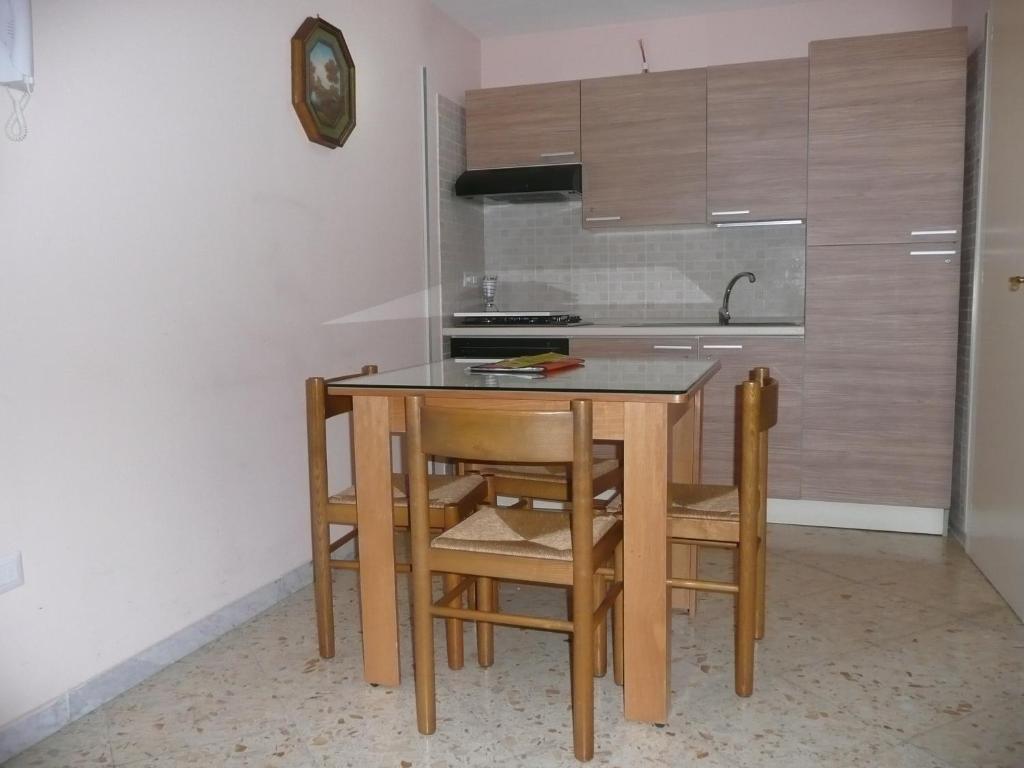 Kuchyň nebo kuchyňský kout v ubytování I Papiri B&B Aparthotel