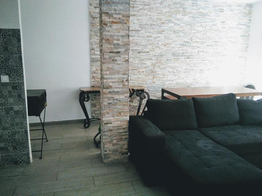 Posezení v ubytování New Trendy apartment