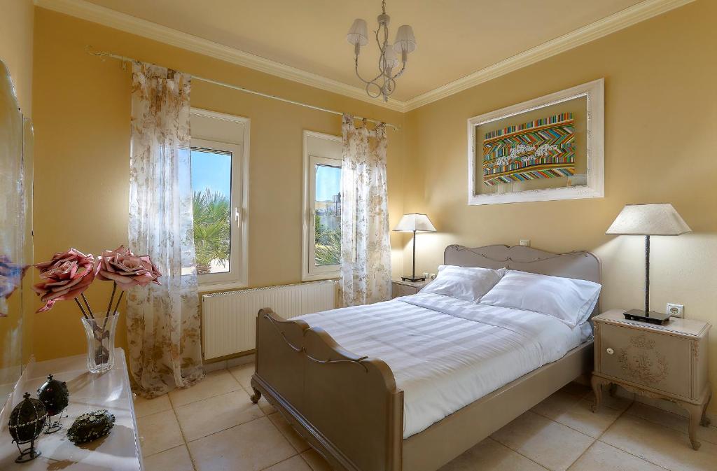 Postel nebo postele na pokoji v ubytování Villa Living E-motion