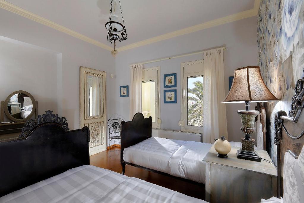 Postel nebo postele na pokoji v ubytování Villa Living E-motion