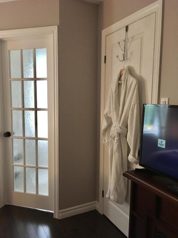 TV a/nebo společenská místnost v ubytování Au Gré Du Temps - Gîte B&B