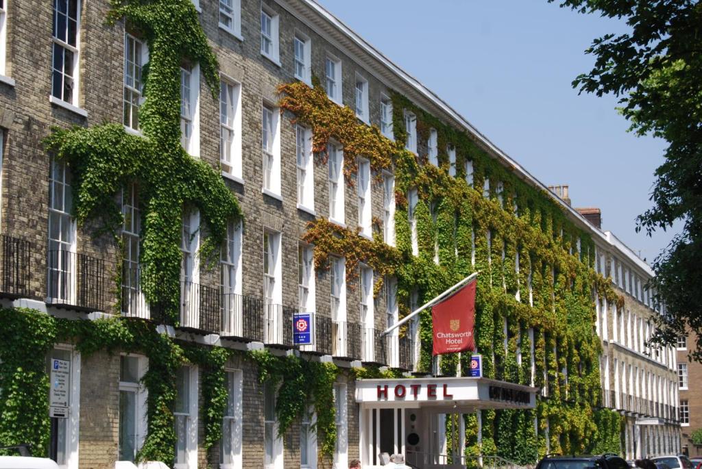 a building with ivy growing on the side of it at The Chatsworth Hotel in Worthing