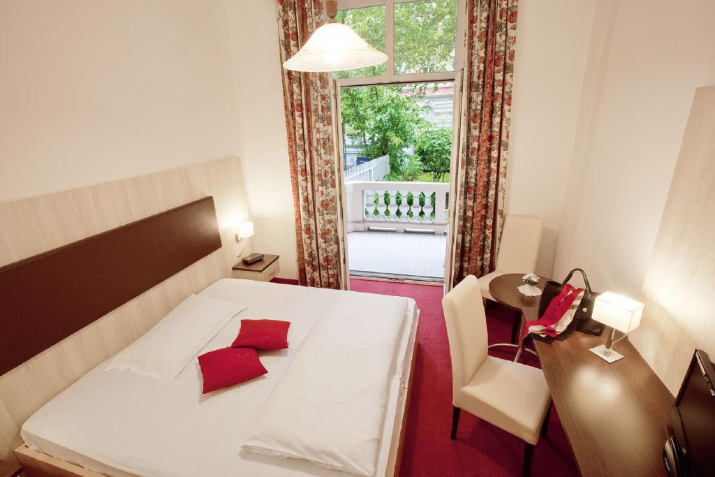 Postel nebo postele na pokoji v ubytování Grand Hotel Bellevue - adults only