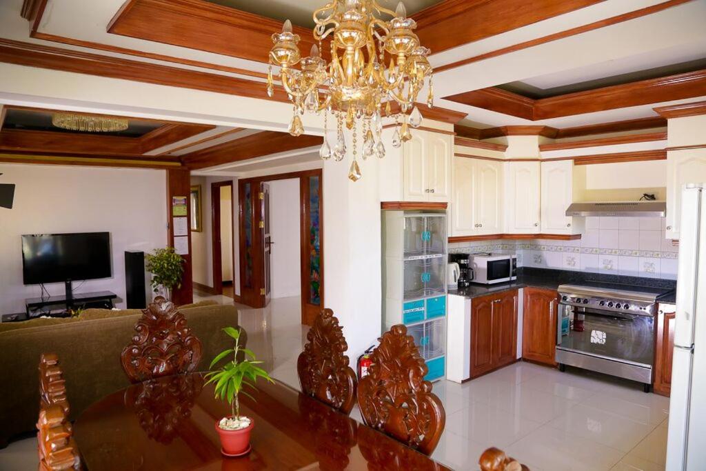 A kitchen or kitchenette at Florabells Iraya Guest House - Batanes