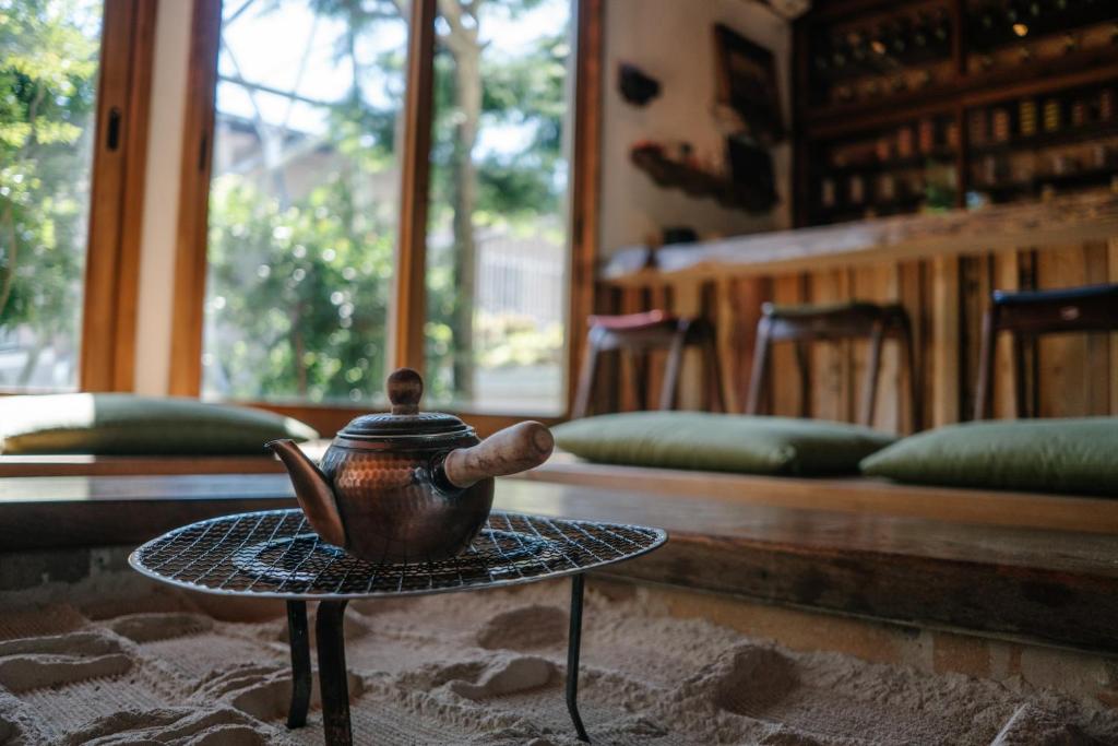 Posezení v ubytování Irori Guest House Tenmaku