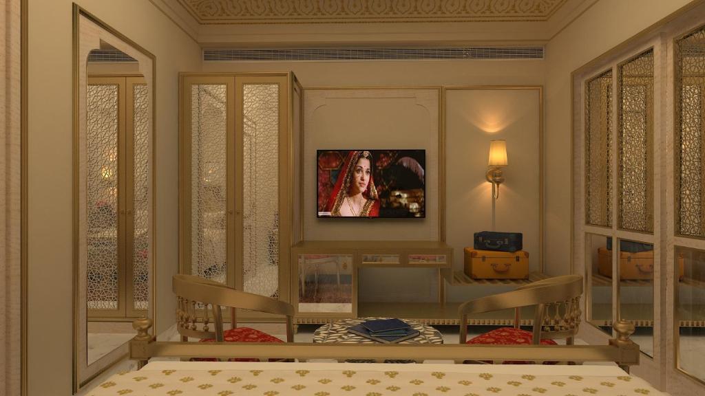 TV a/nebo společenská místnost v ubytování Laxmi Palace Heritage Boutique Hotel