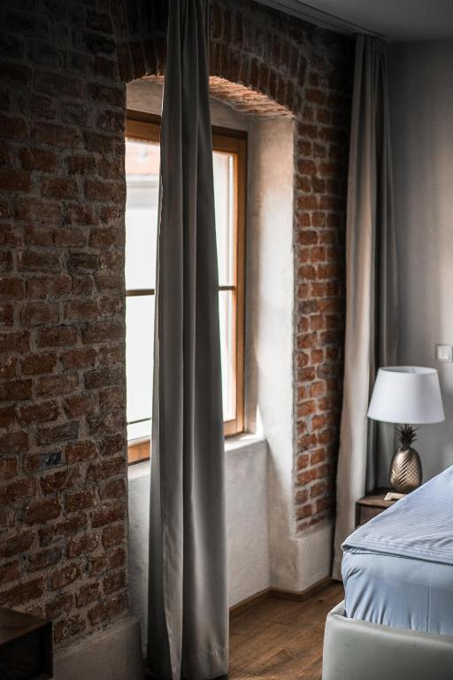 Postel nebo postele na pokoji v ubytování Hotel Rote19
