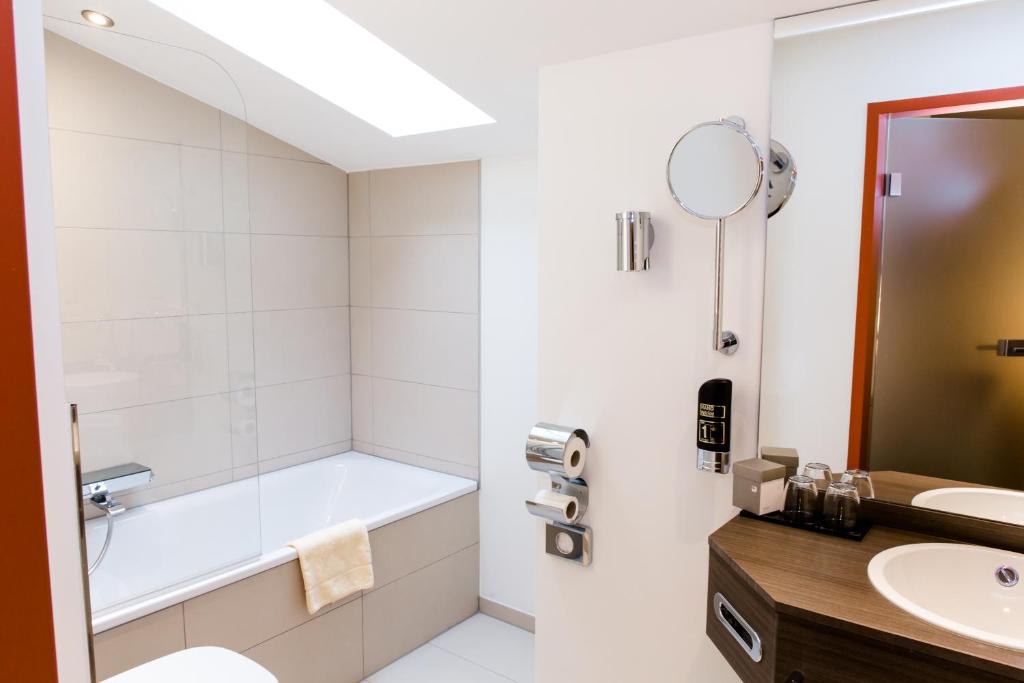 Koupelna v ubytování TaunusTagungsHotel