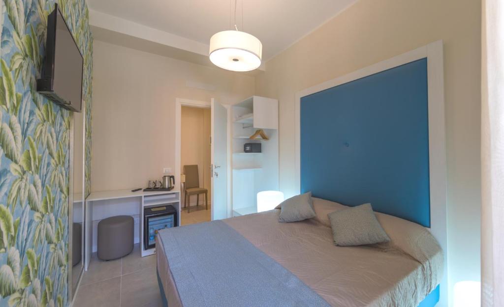 Postel nebo postele na pokoji v ubytování B&B Fablas