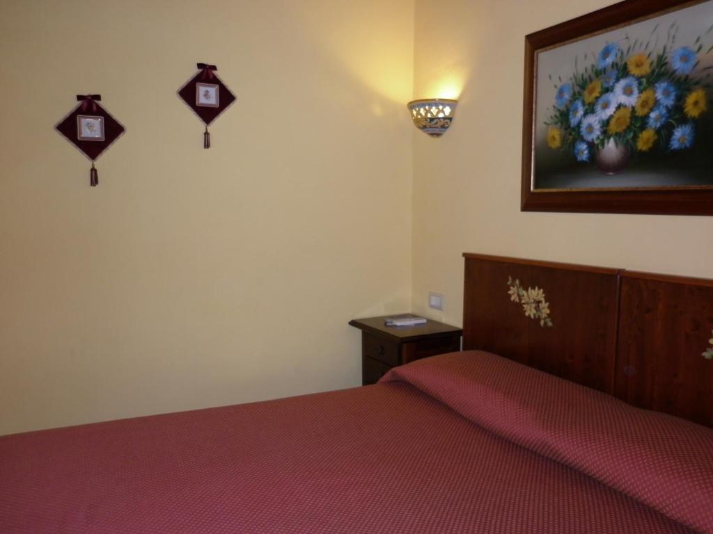 Postel nebo postele na pokoji v ubytování B&B Triskèles