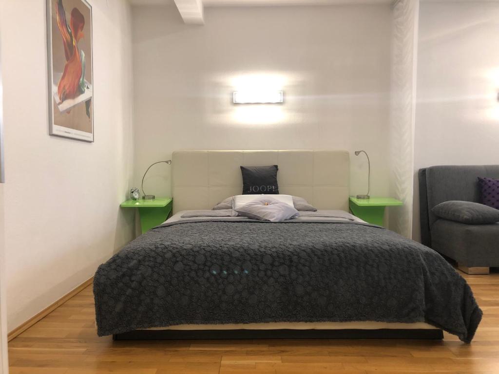 Postel nebo postele na pokoji v ubytování Design Apartment - Centrally located