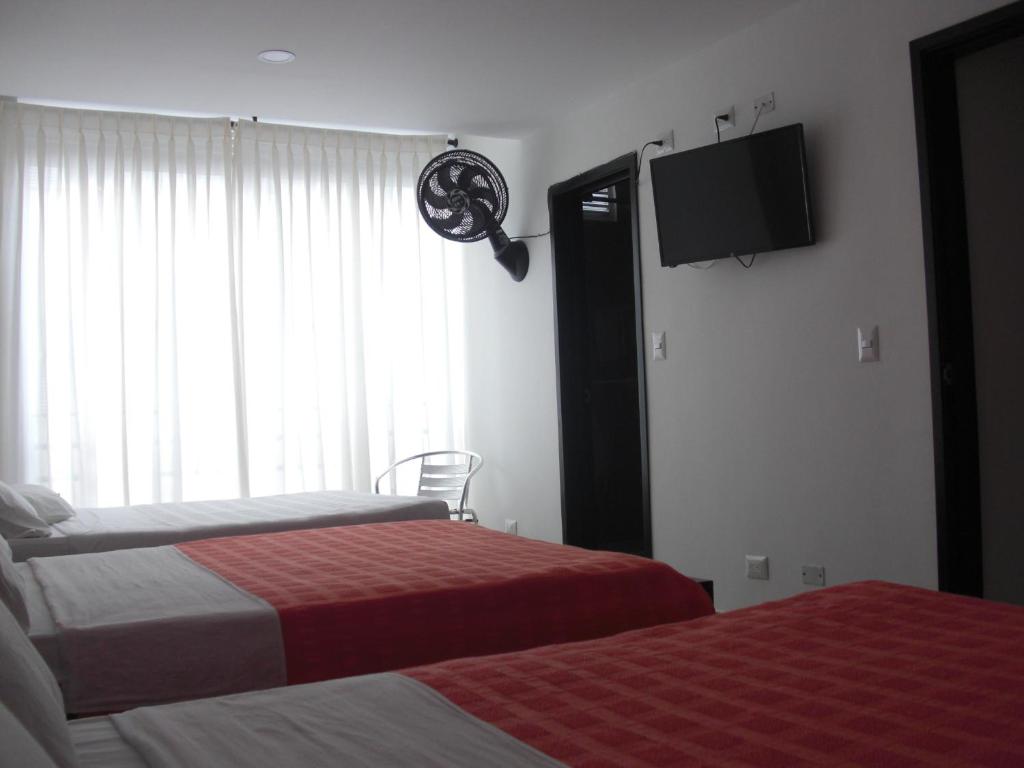 Voodi või voodid majutusasutuse Hotel Aussie koala toas