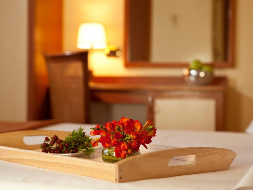 Postel nebo postele na pokoji v ubytování Hotel Bikini