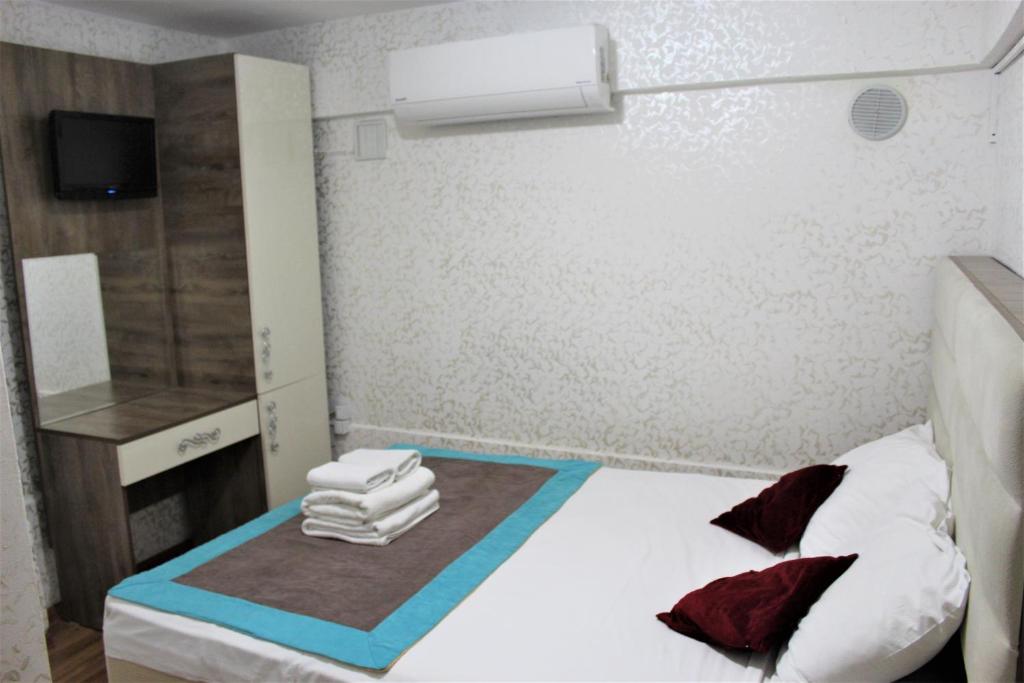 Postel nebo postele na pokoji v ubytování Divas Hotel