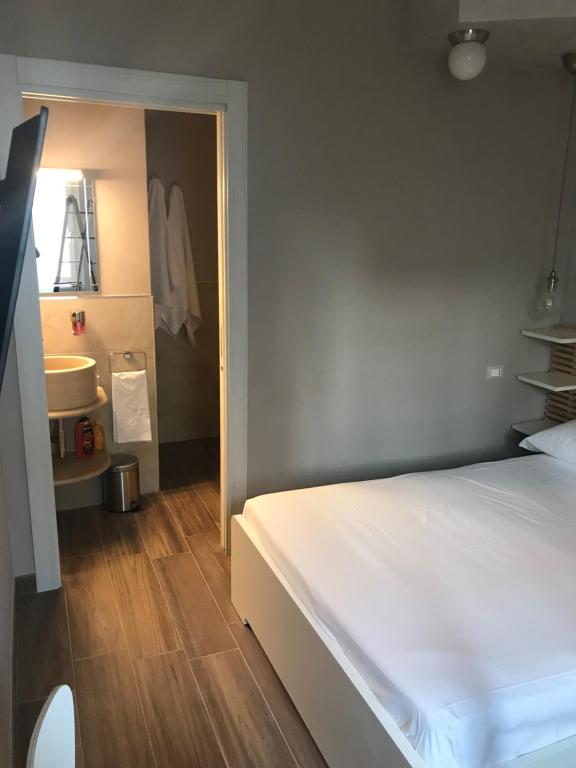 Postel nebo postele na pokoji v ubytování A.J. B&B