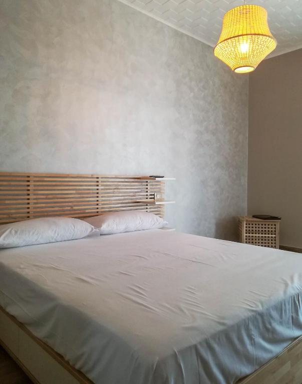 Postel nebo postele na pokoji v ubytování A.J. B&B