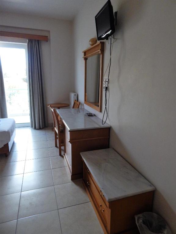 TV a/nebo společenská místnost v ubytování Hotel Lykeon