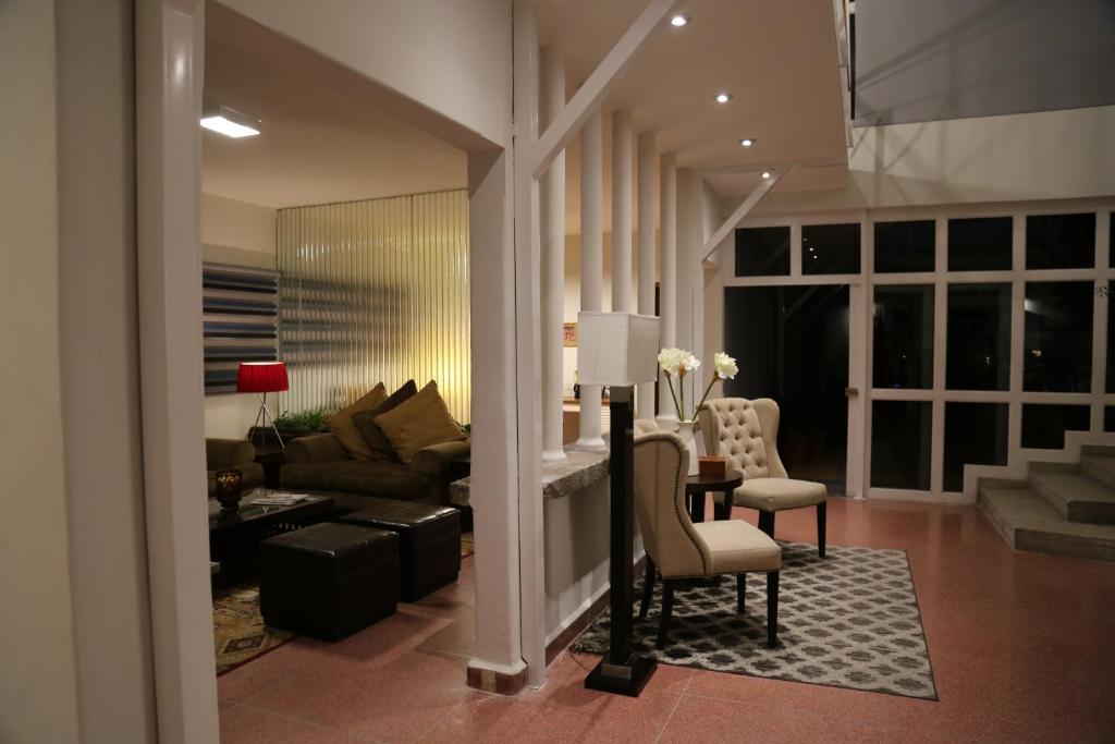 Posezení v ubytování Casa Massima Hotel