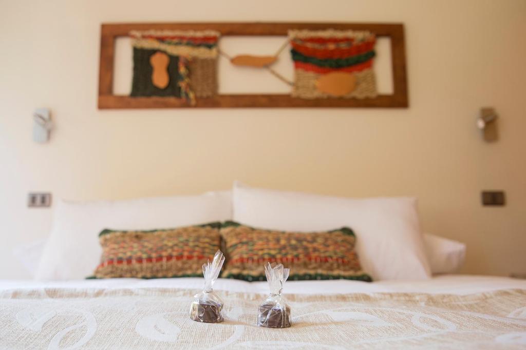Cama o camas de una habitación en Maki Hotel