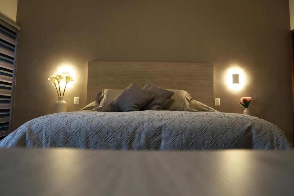 Postel nebo postele na pokoji v ubytování Casa Massima Hotel