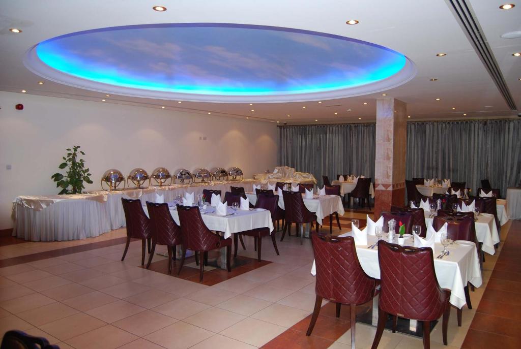 Restaurace v ubytování Al Madina Suites Doha