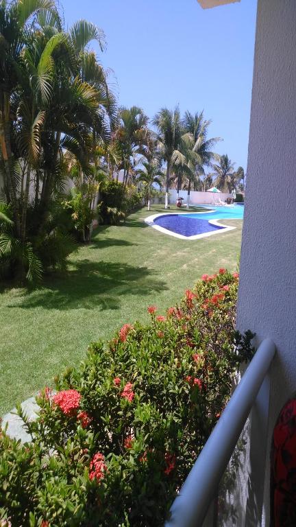  Sonia Flats - Apartamento térreo em condominio em frente à Praia de Camurupim