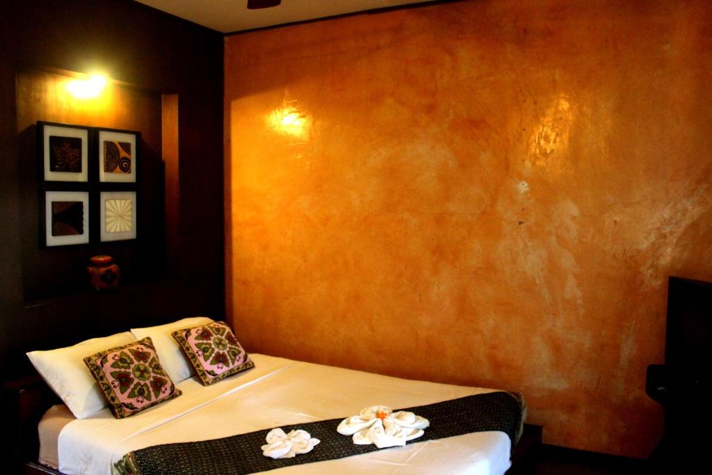 Postel nebo postele na pokoji v ubytování Baantawan Guesthouse Pai