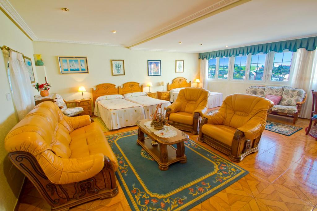 A seating area at Hospedaje Roiz