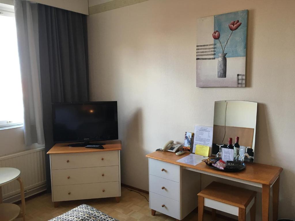 TV a/nebo společenská místnost v ubytování Finlandia Hotel Fooninki