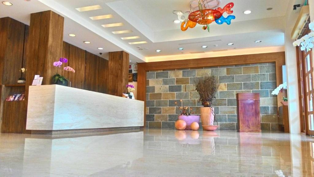 Vstupní hala nebo recepce v ubytování Hua Ge Hot Spring Hotel