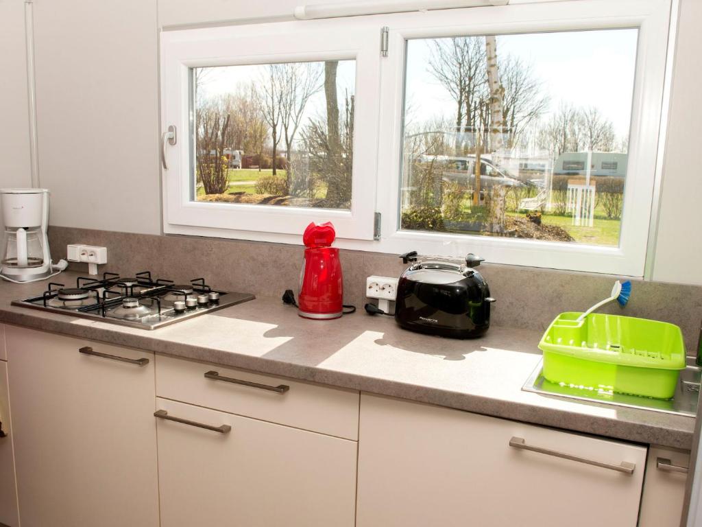 Kuchyň nebo kuchyňský kout v ubytování Camping Strukkamphuk
