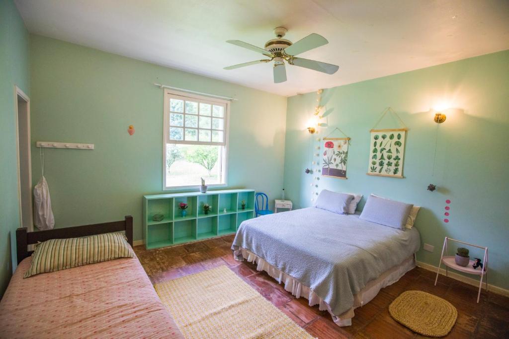 A bed or beds in a room at Villaggio Serra da Cantareira