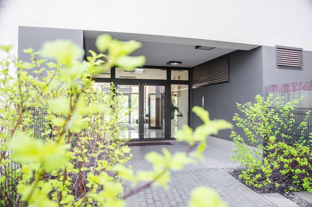 Vonkajšia záhrada v ubytovaní Apartament Expo Brylowska