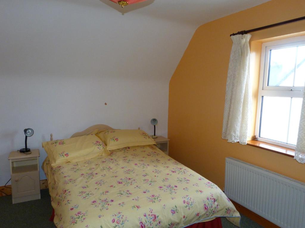 Postel nebo postele na pokoji v ubytování Skellig Cottages