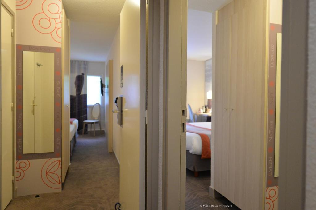 Postel nebo postele na pokoji v ubytování Best Western Auray le Loch
