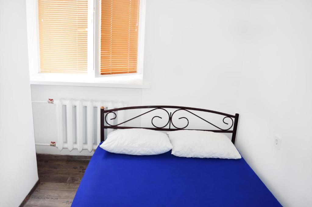 Postel nebo postele na pokoji v ubytování Hostel Vokzal